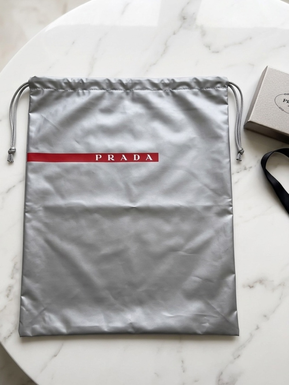 Vintage Prada Silver Drawstring Dust Bag with Red Logo Stripe